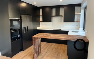 handleless kitchen with timber and quartz worktop 